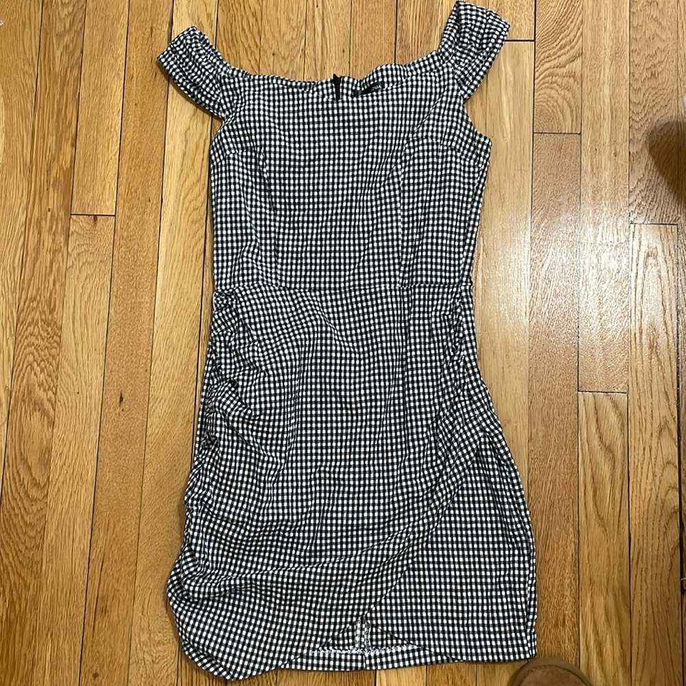 Aqua slim fitting black and white checkered dress.